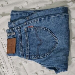 Vintage red taps women's high waisted blue jeans 26x29